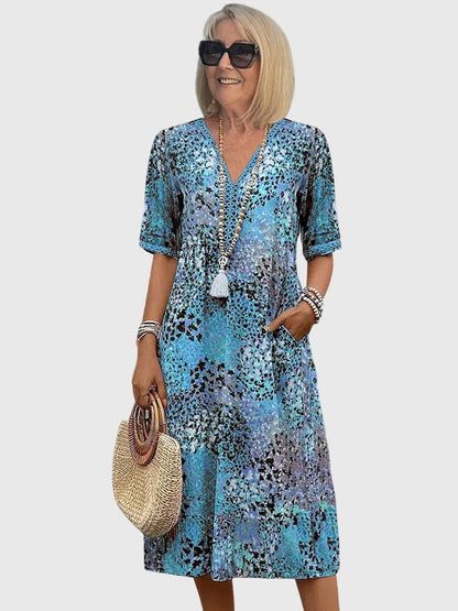 Aurelia™ | Midi Blumenkleid mit figurschmeichelndem Schnitt